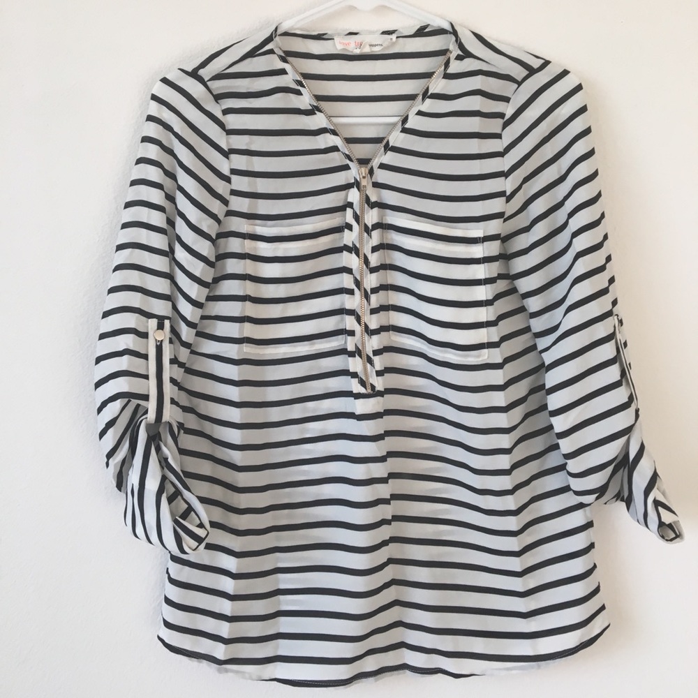 Black and white striped blouse.
